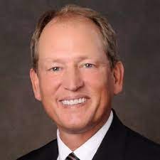 Rick Neuheisel professional portrait